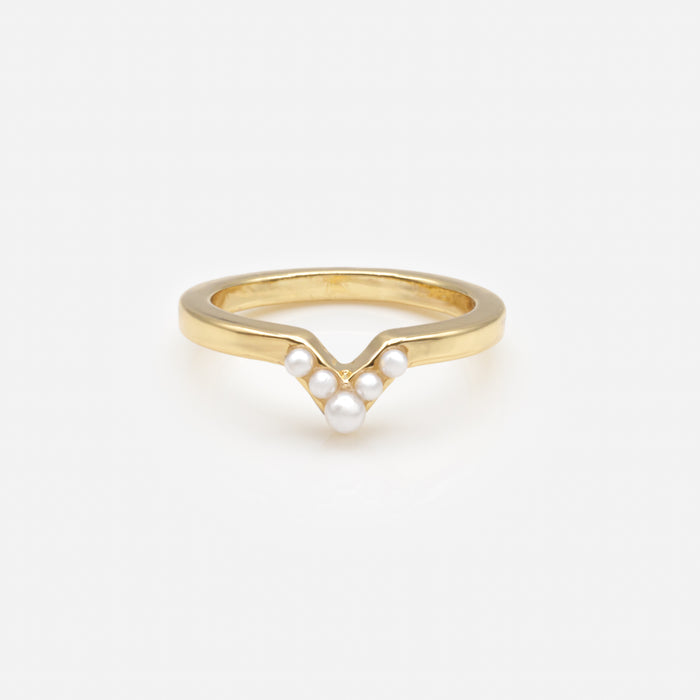 Golden ring with small "V" shaped pearls