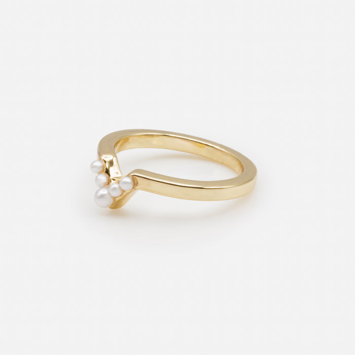 Golden ring with small "V" shaped pearls