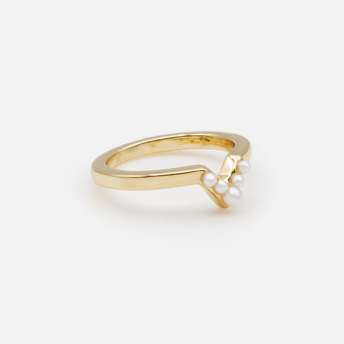 Golden ring with small "V" shaped pearls