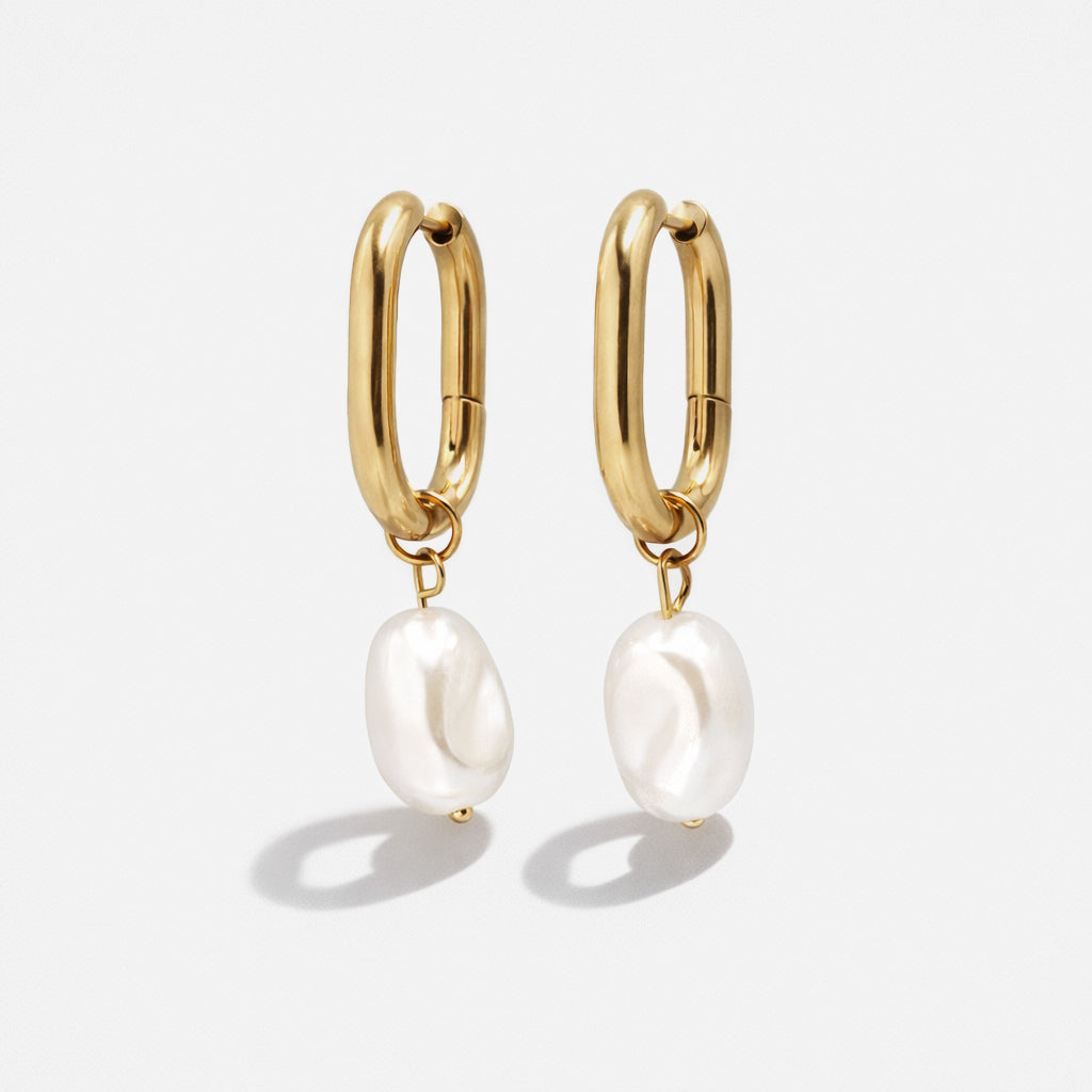 Oval gold hoop earrings with synthetic pearl