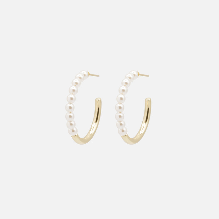 Gold hoop earrings with half synthetic pearls