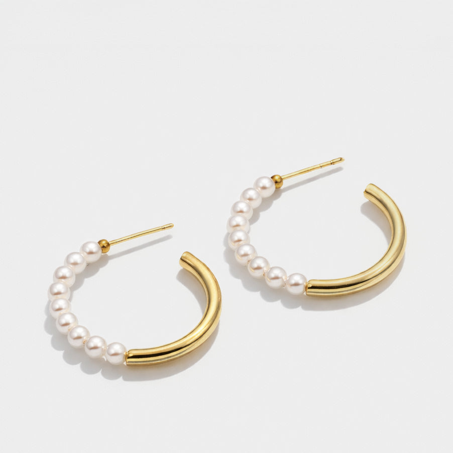 Gold hoop earrings with half synthetic pearls