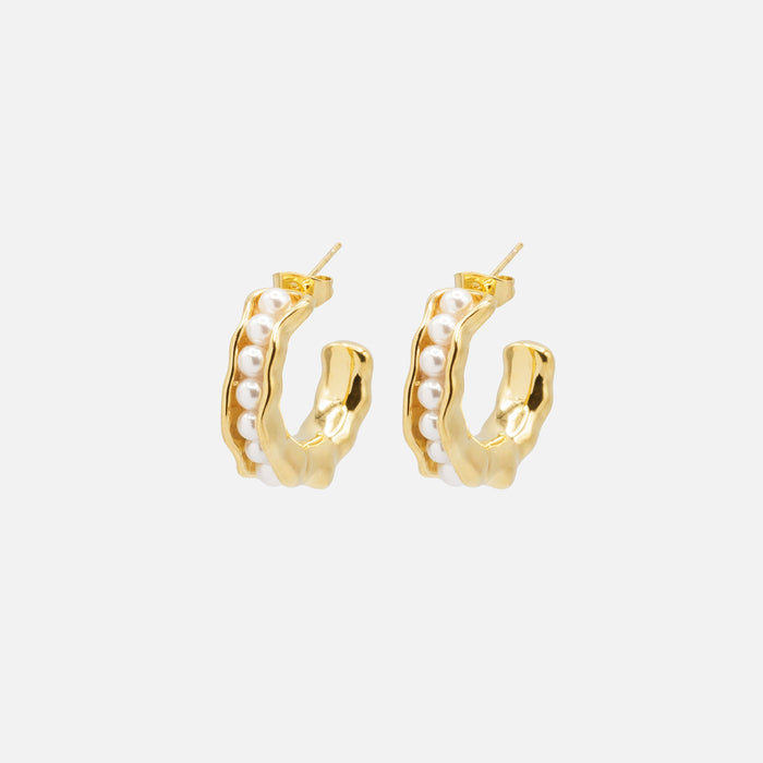 Open gold hoop earrings with synthetic pearl insert
