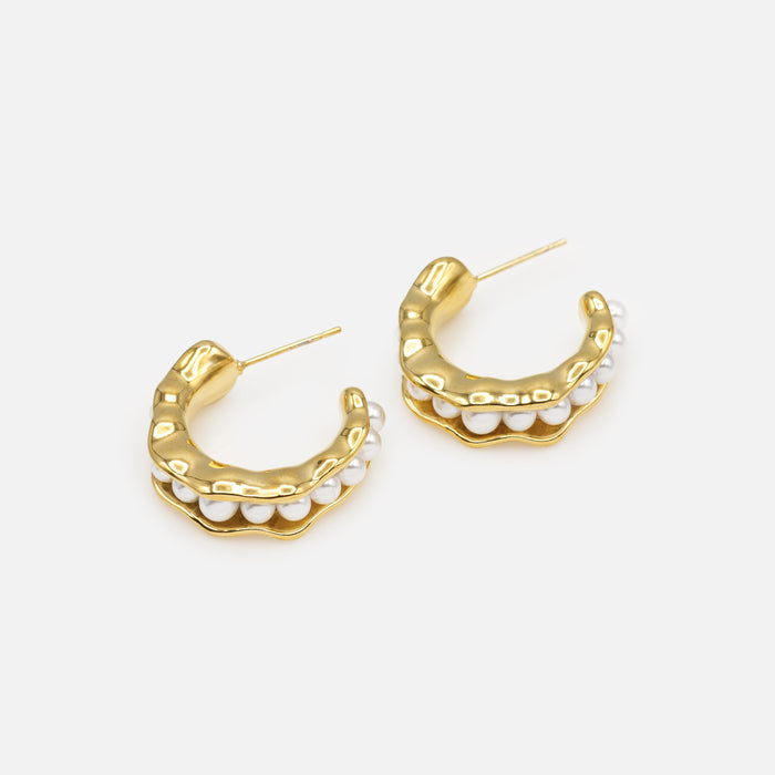 Open gold hoop earrings with synthetic pearl insert