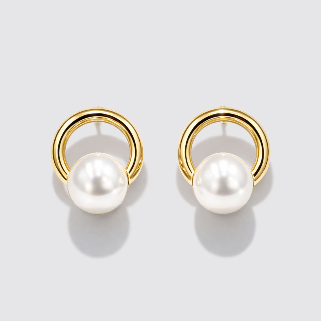Boucles d'oreilles anneaux doré avec perle