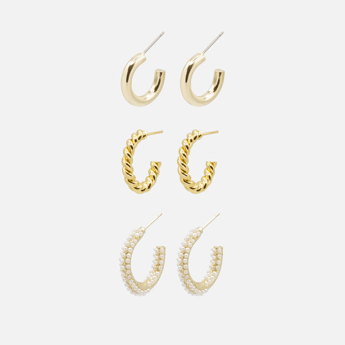 Trio of gold hoop earrings