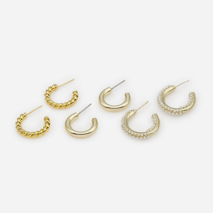 Trio of gold hoop earrings