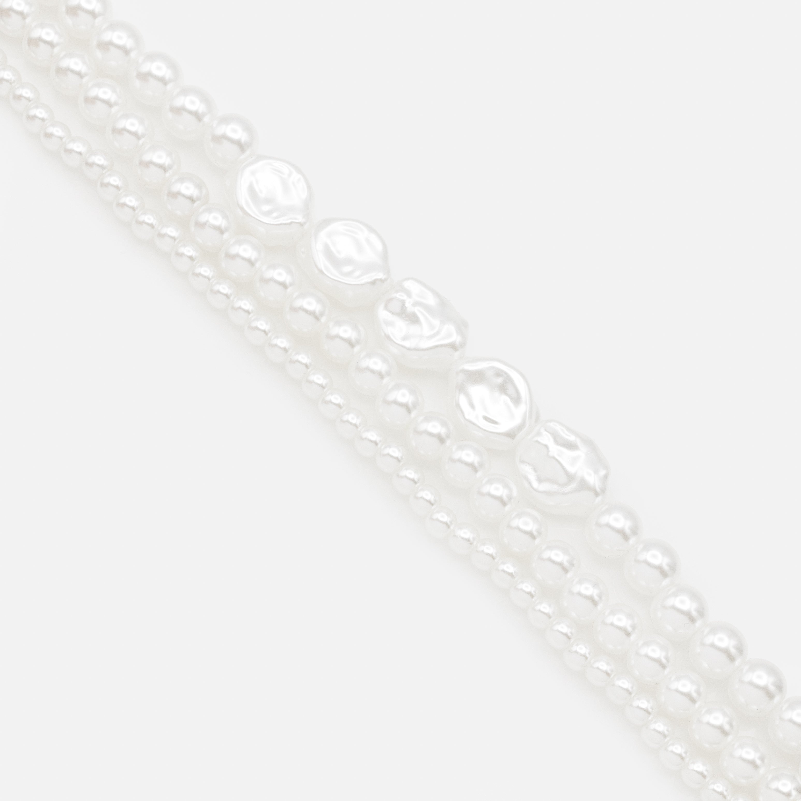 Bracelet trois rangs avec perles variées