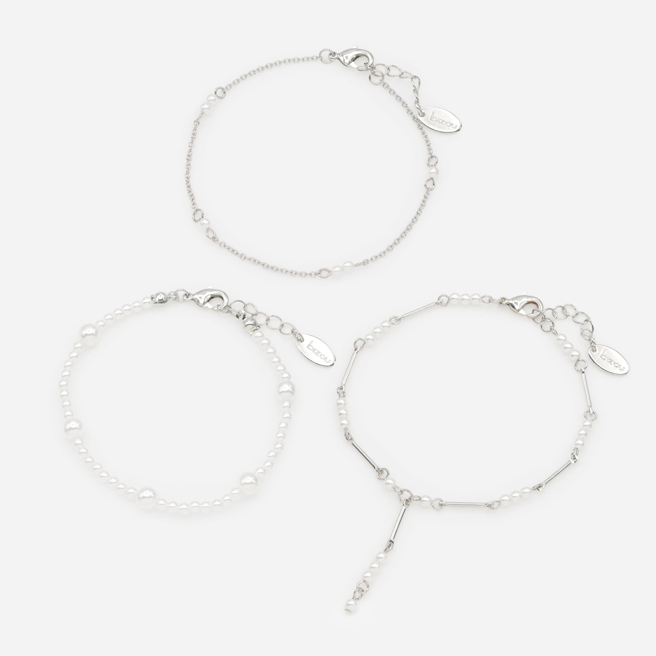 Trio of silver bracelets with pearls