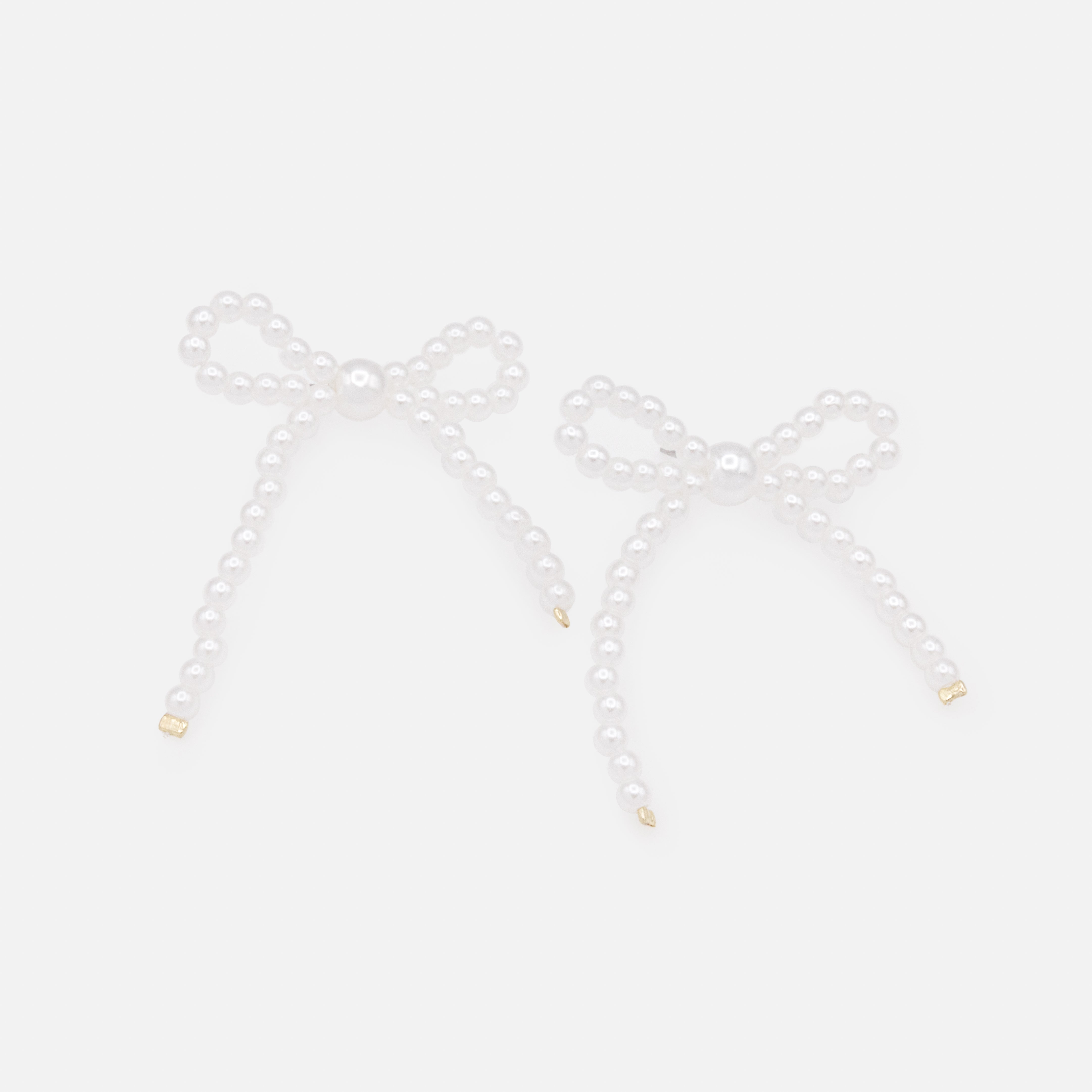Boucles d'oreilles de perles en forme de boucle