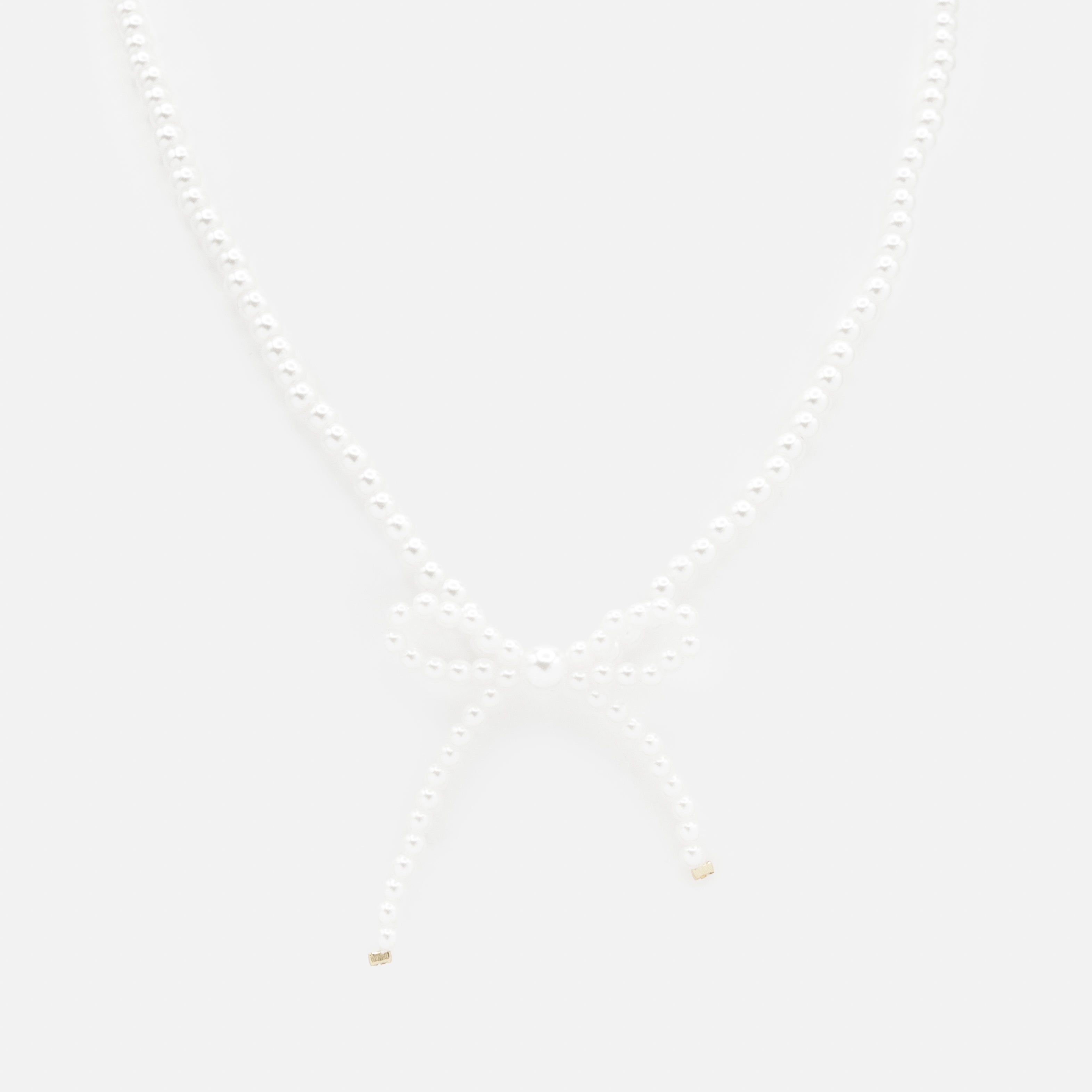 Collier de perles avec boucle latérale