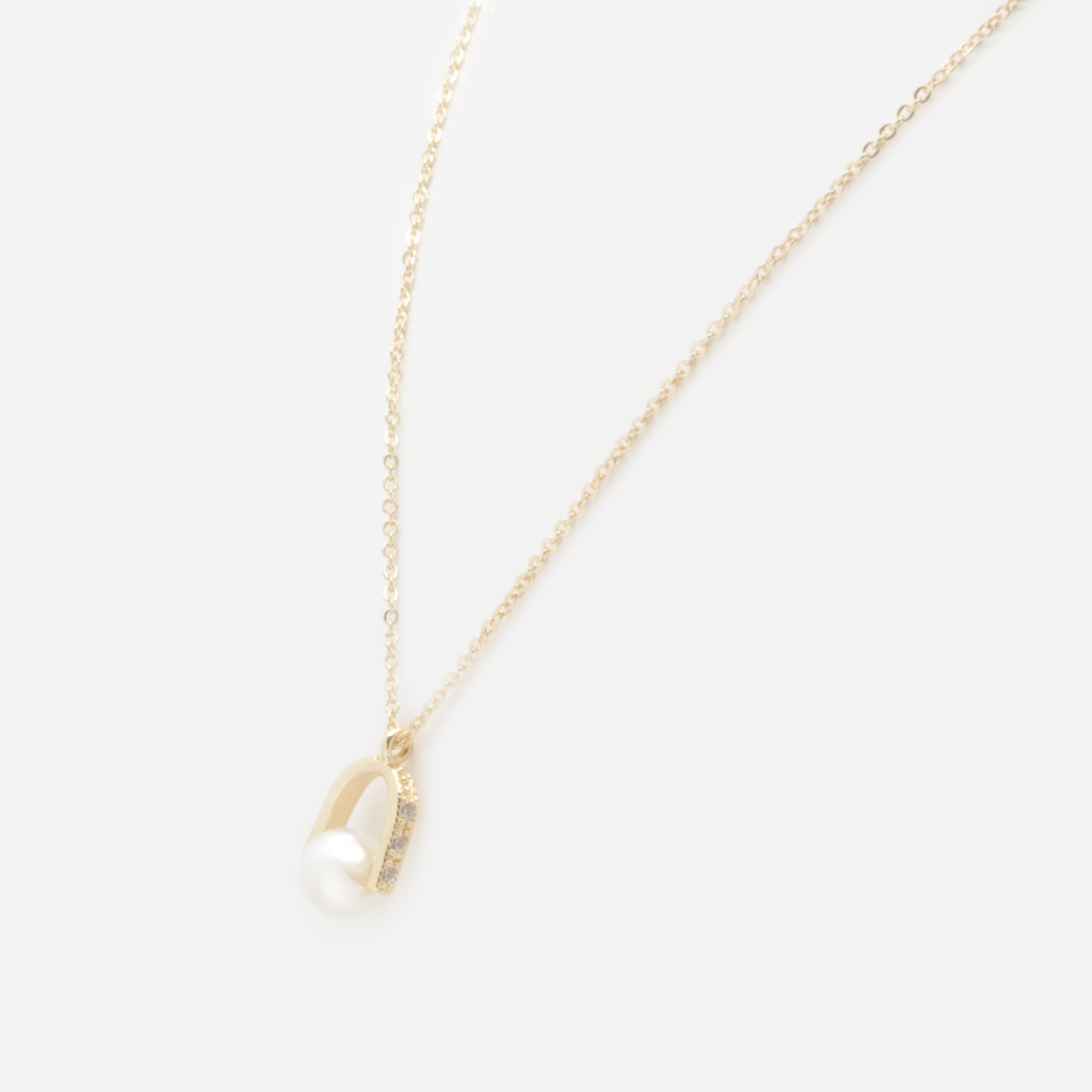 Collier doré breloque cloche avec perle ronde