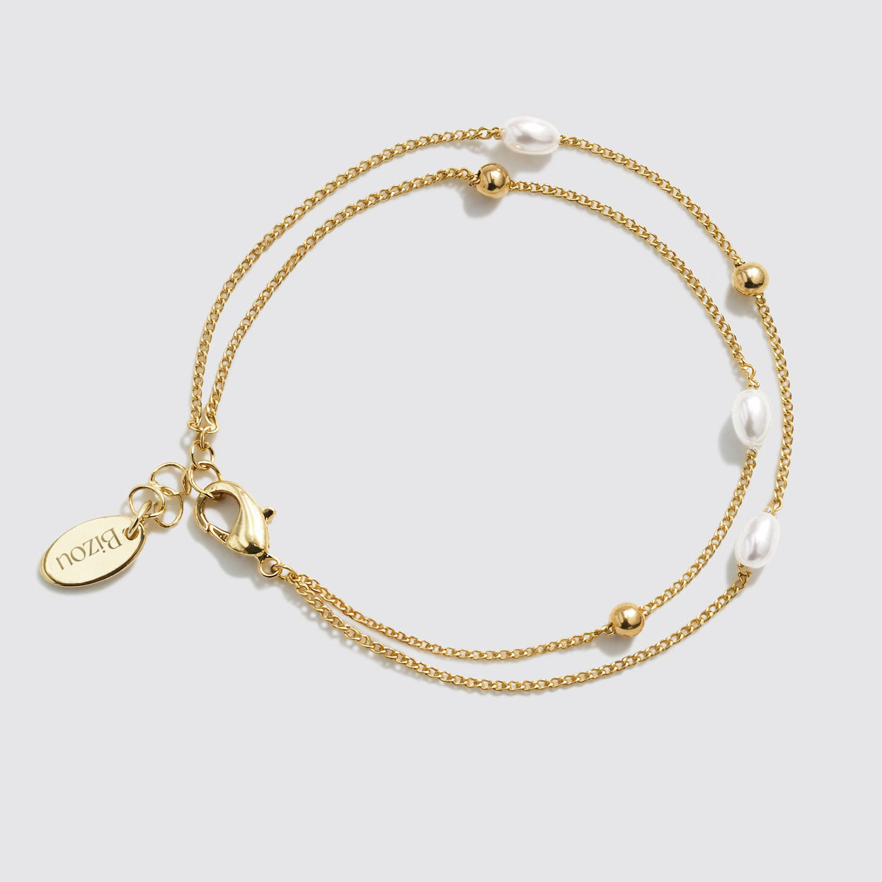 Bracelet double rang doré à perles et billes