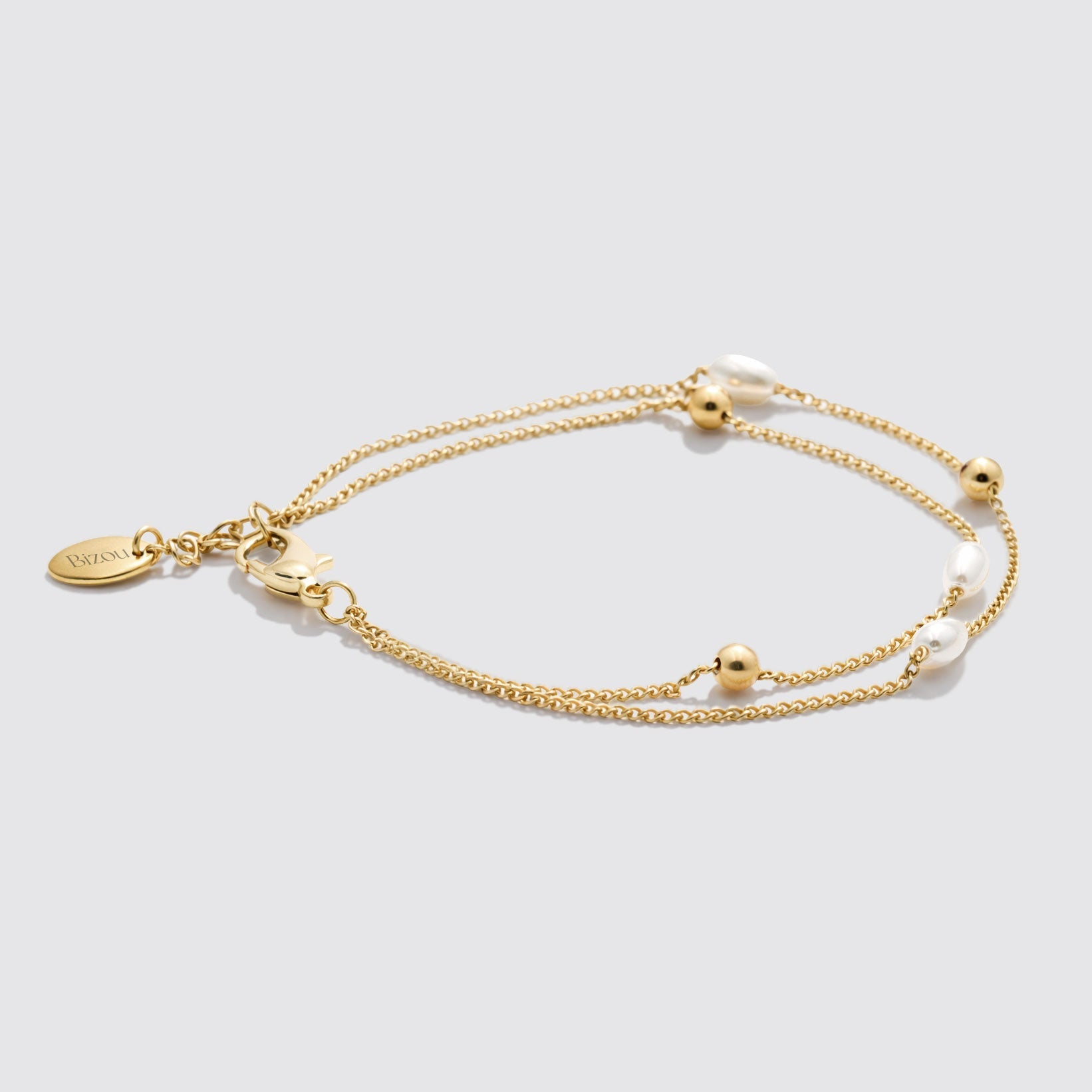 Bracelet double rang doré à perles et billes