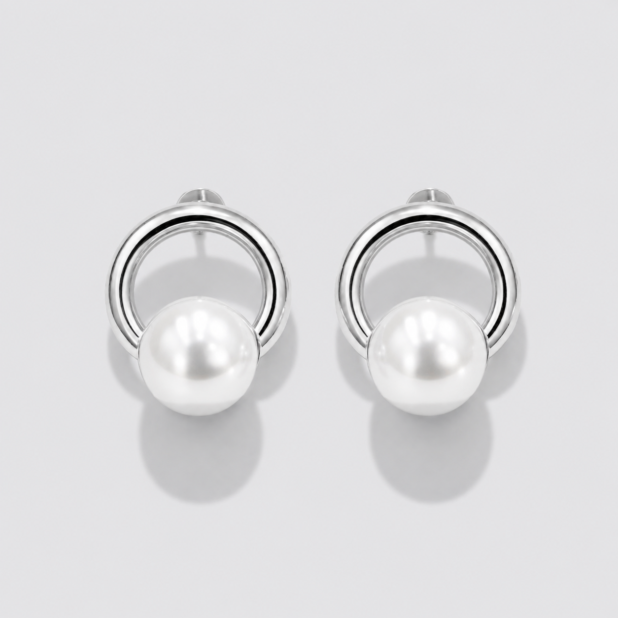Boucles d'oreilles anneaux argenté avec perle