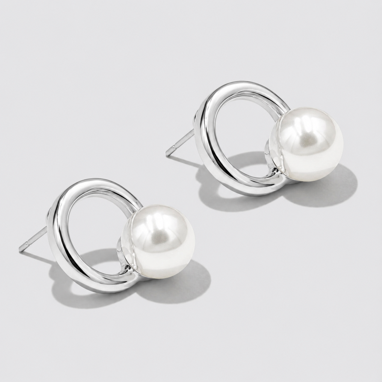 Boucles d'oreilles anneaux argenté avec perle