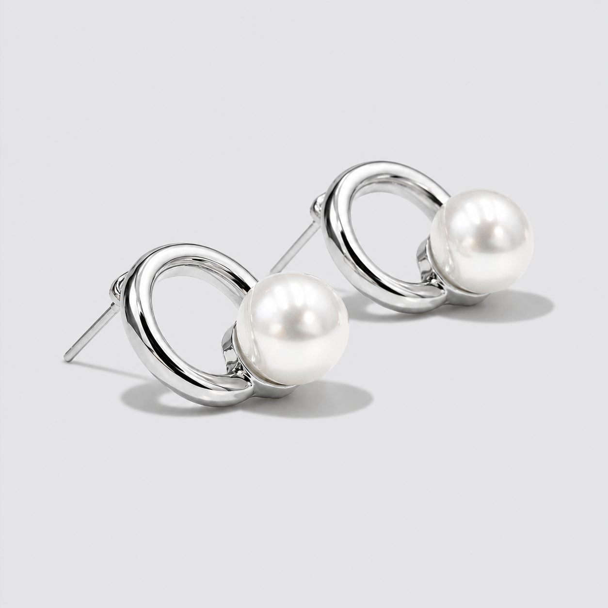 Boucles d'oreilles anneaux argenté avec perle