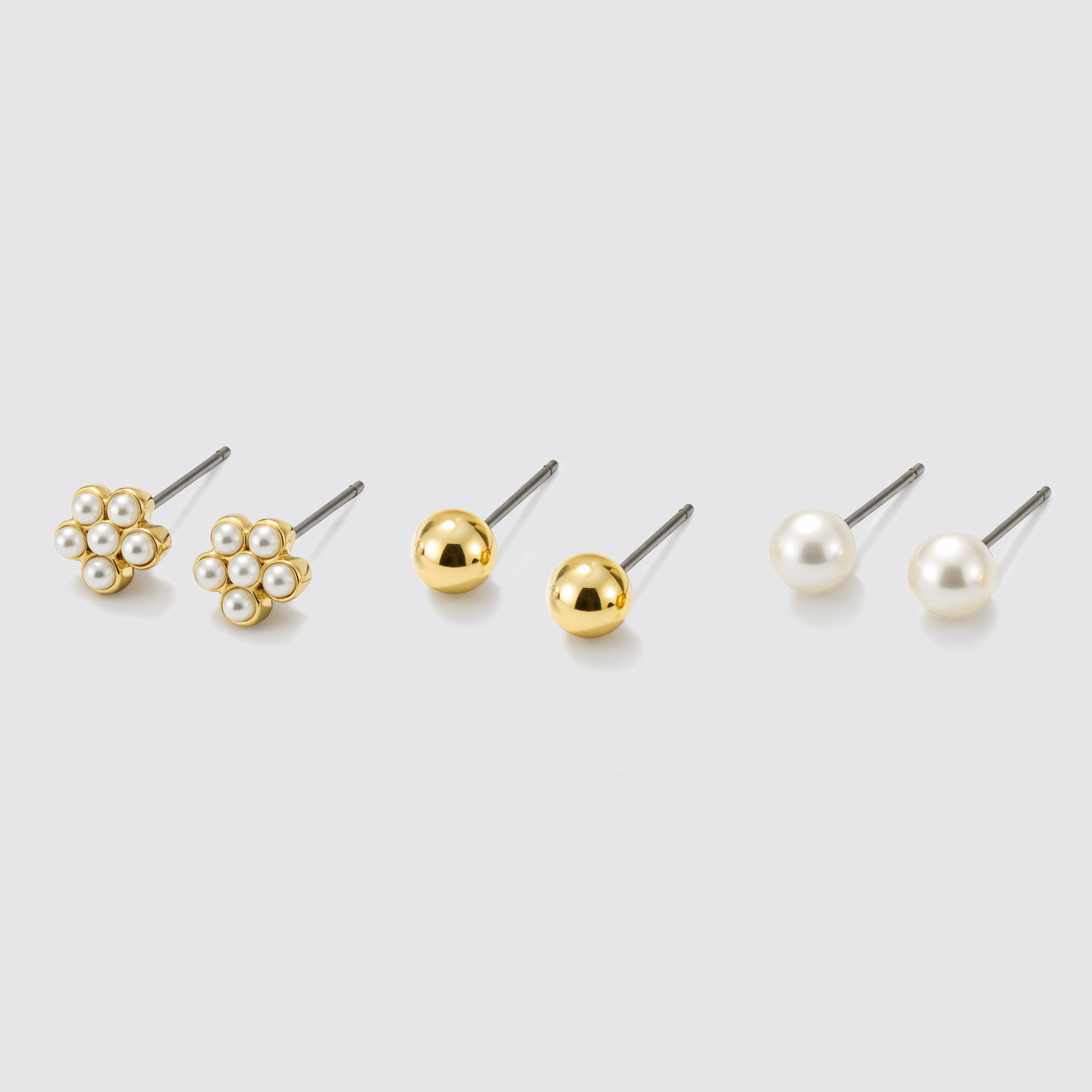 Trio de clous d'oreilles perles et fleurs doré