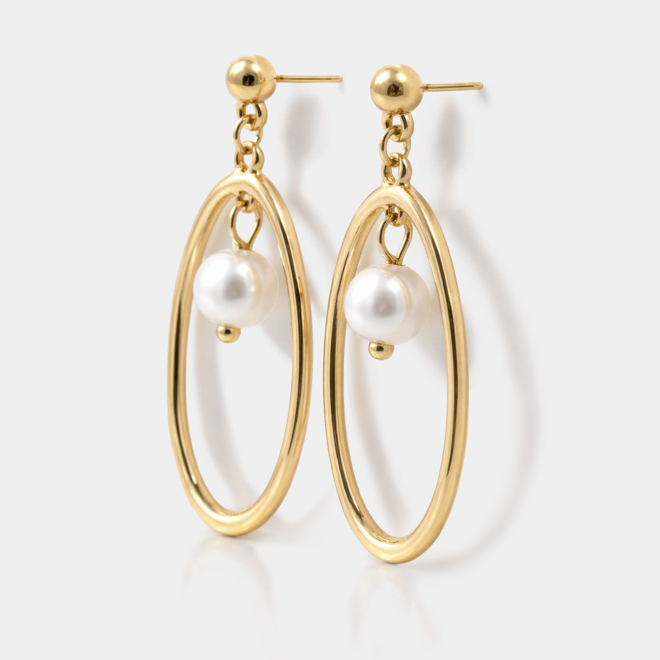 Boucles d'oreilles clous ovales doré avec perle pendante