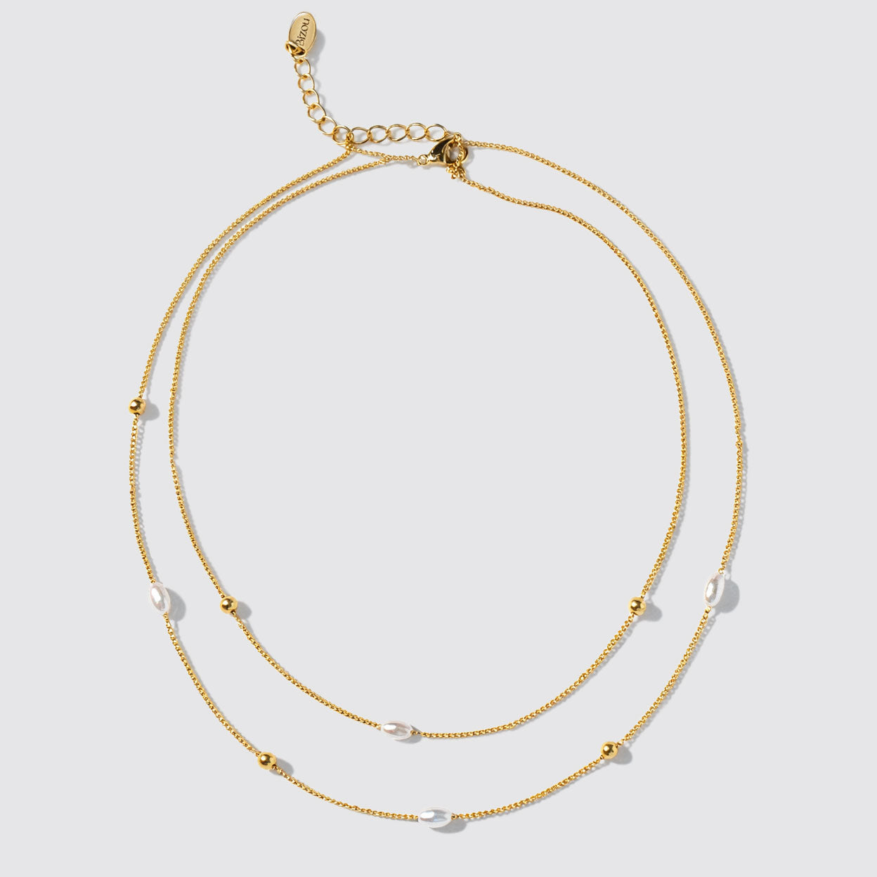 Collier double rang doré à perles et billes