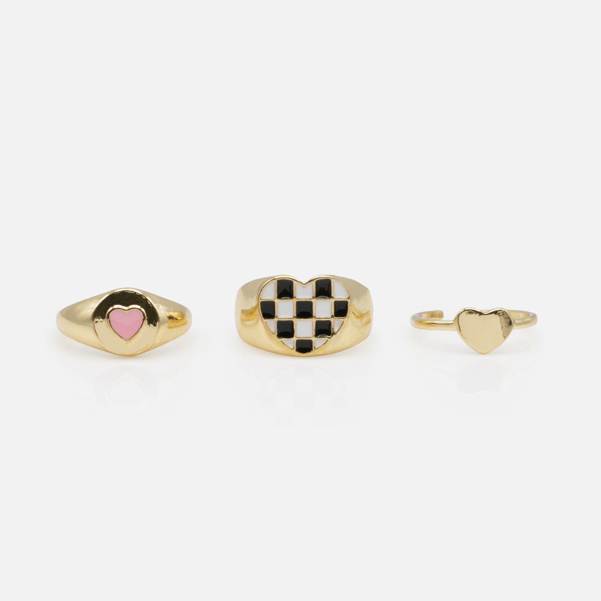 Set of golden open rings with hearts three ways