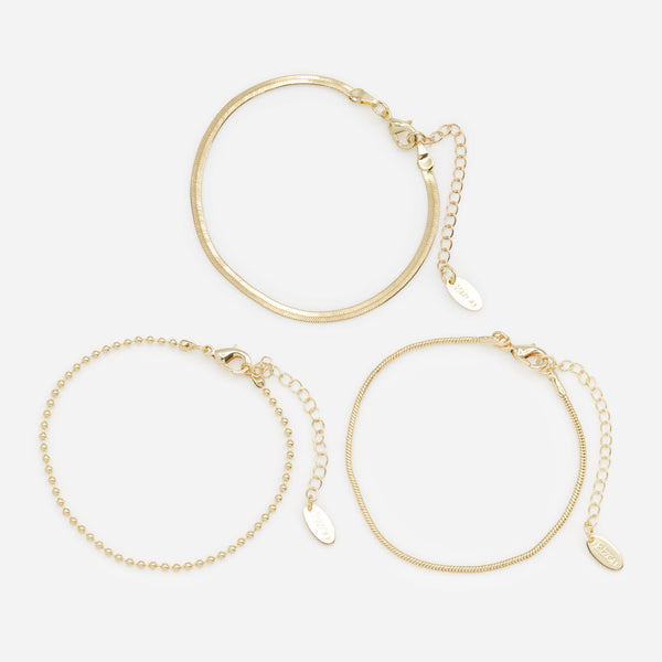 Load image into Gallery viewer, Trio of golden bracelets with varied links
