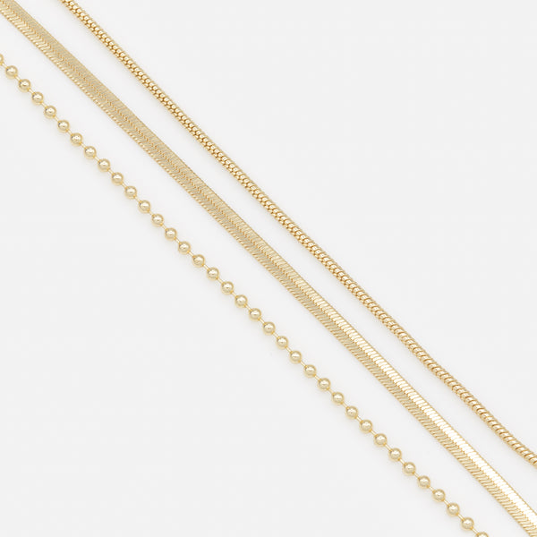 Load image into Gallery viewer, Trio of golden bracelets with varied links
