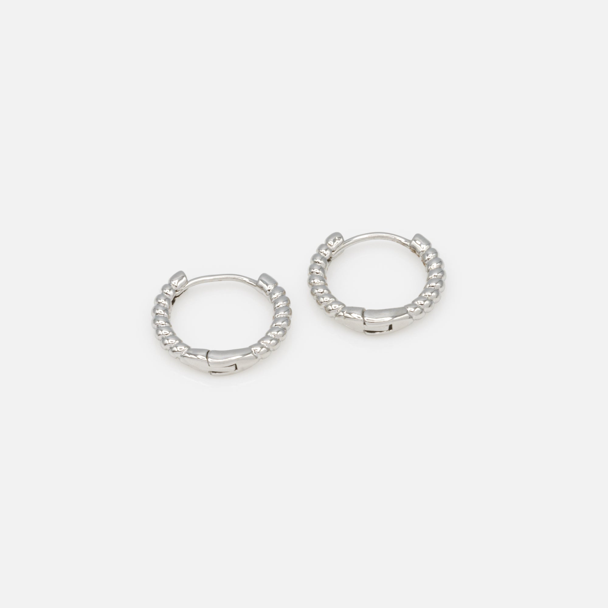 Fine silver hoop earrings with twists