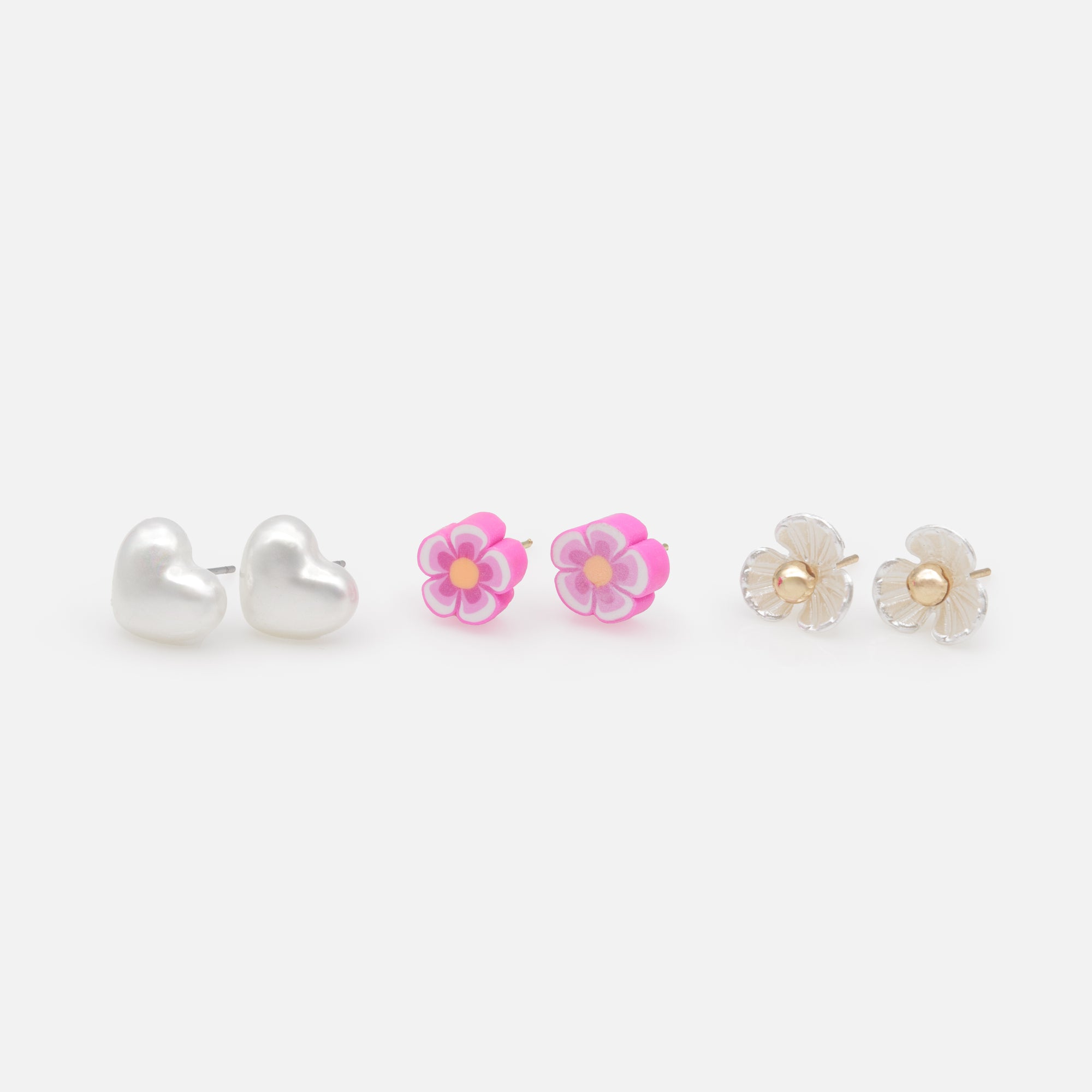 Trio de boucles d'oreilles fixes fleurs et coeurs