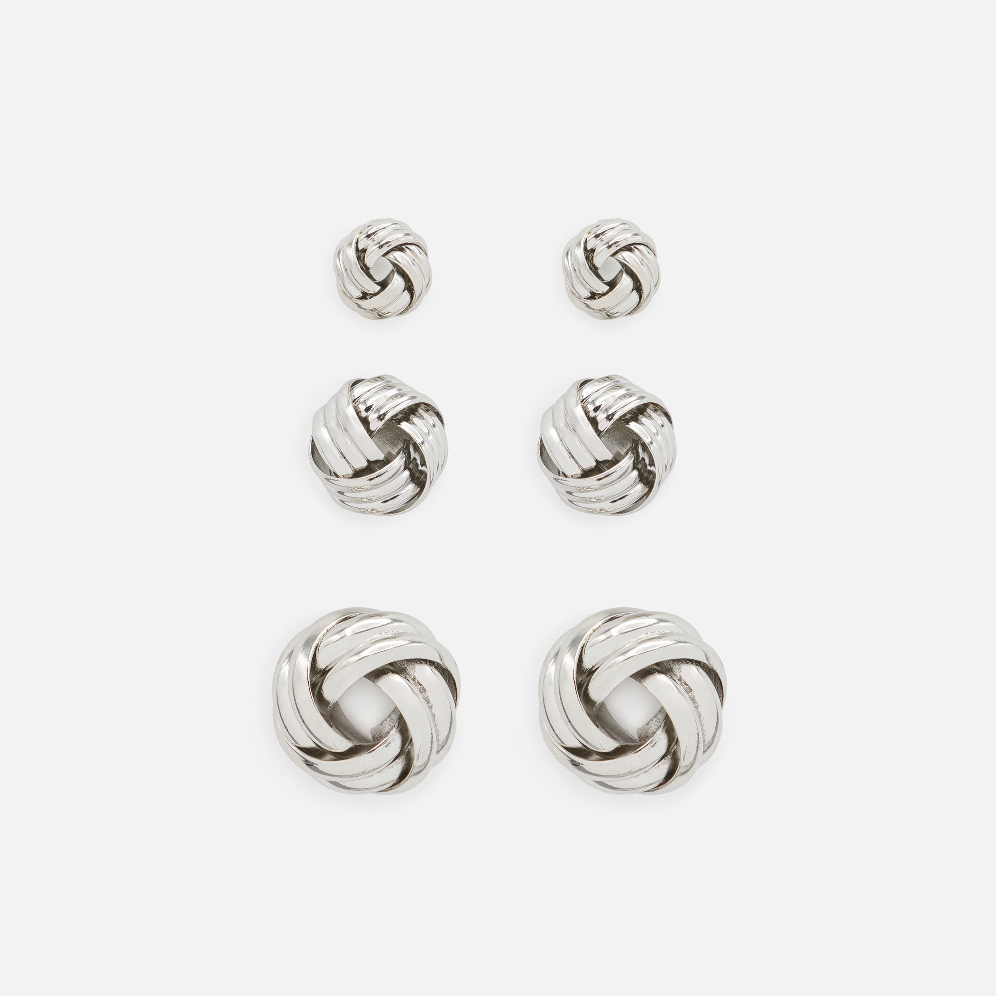 Trio of silver knot earrings