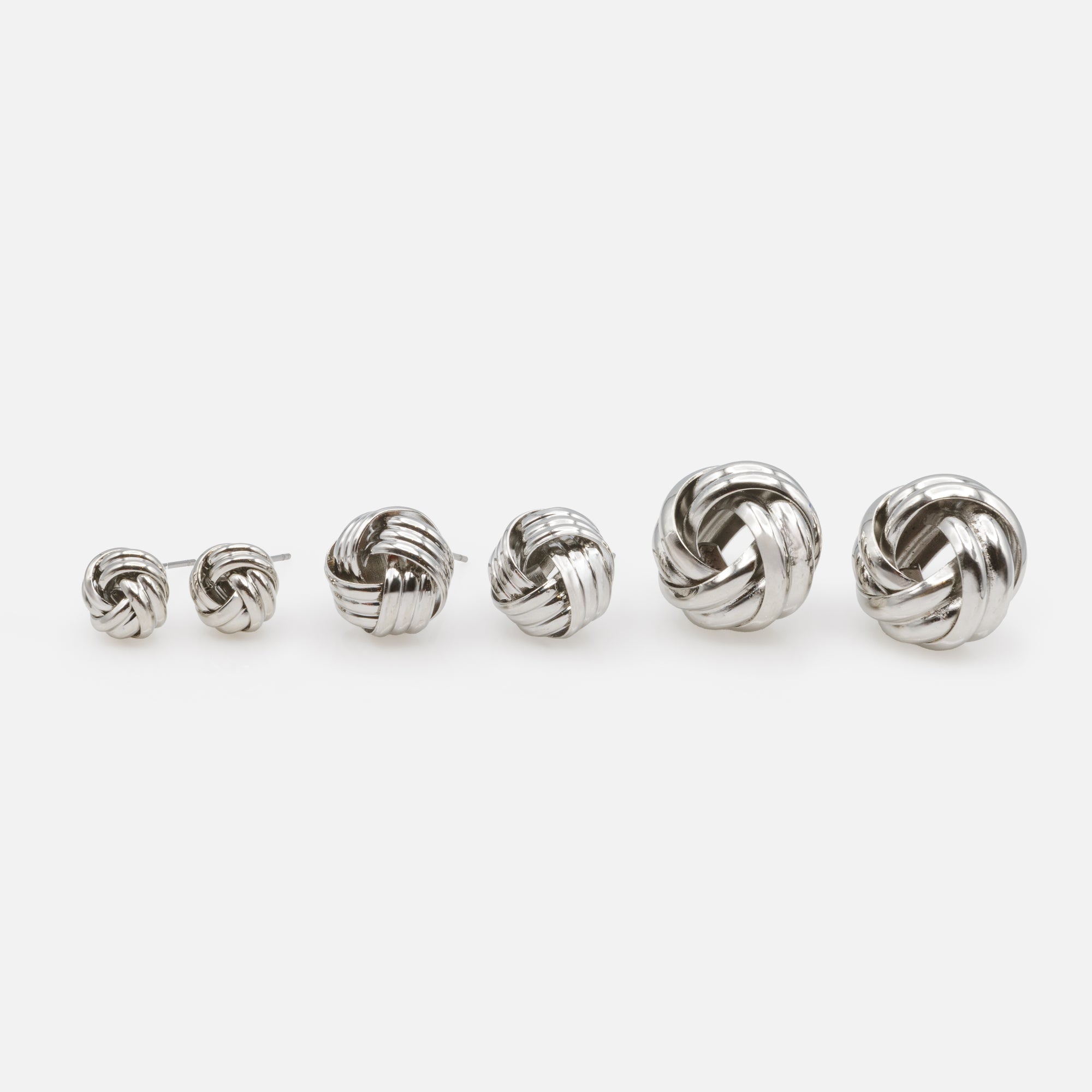 Trio of silver knot earrings