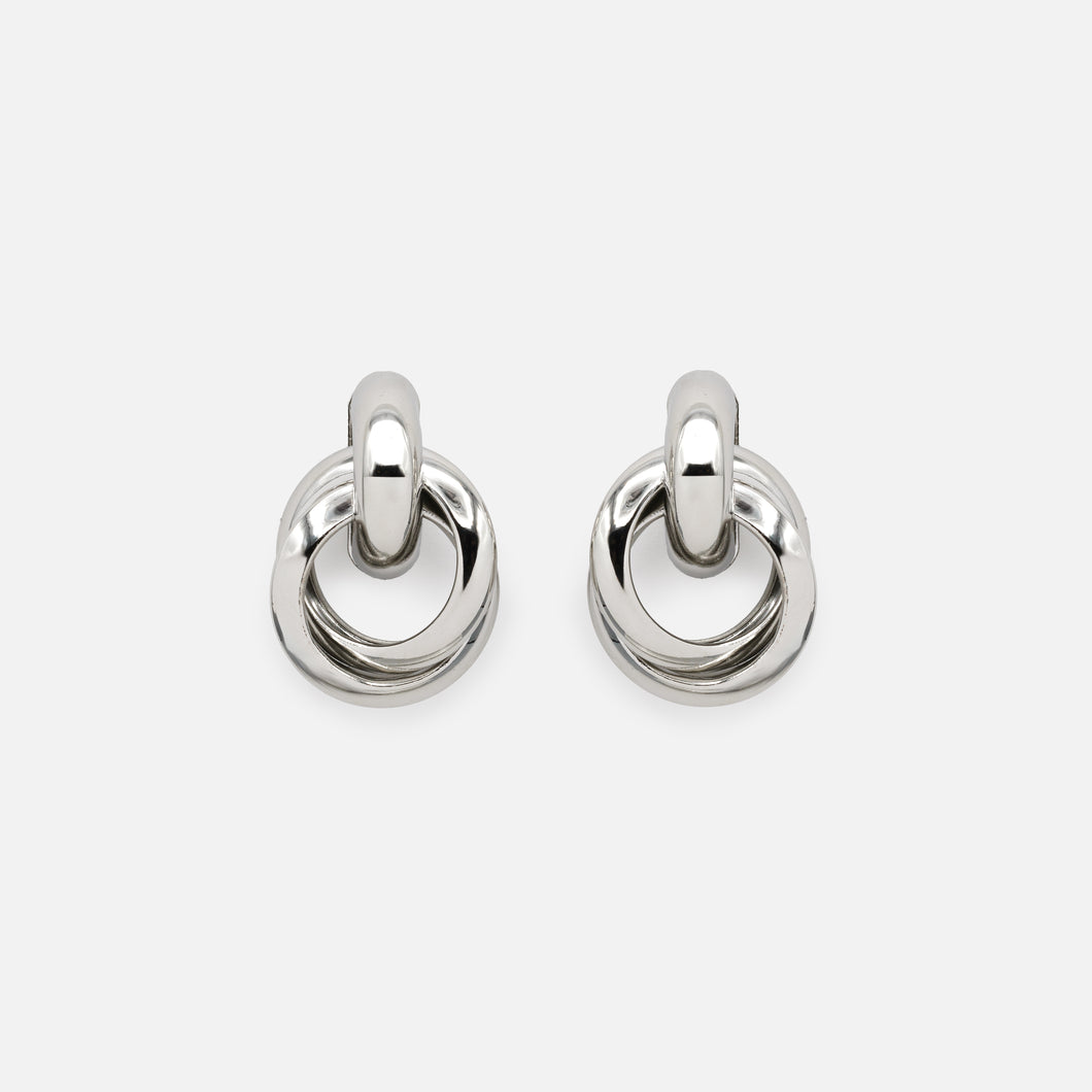 Silver fixed earrings with intertwined hanging rings