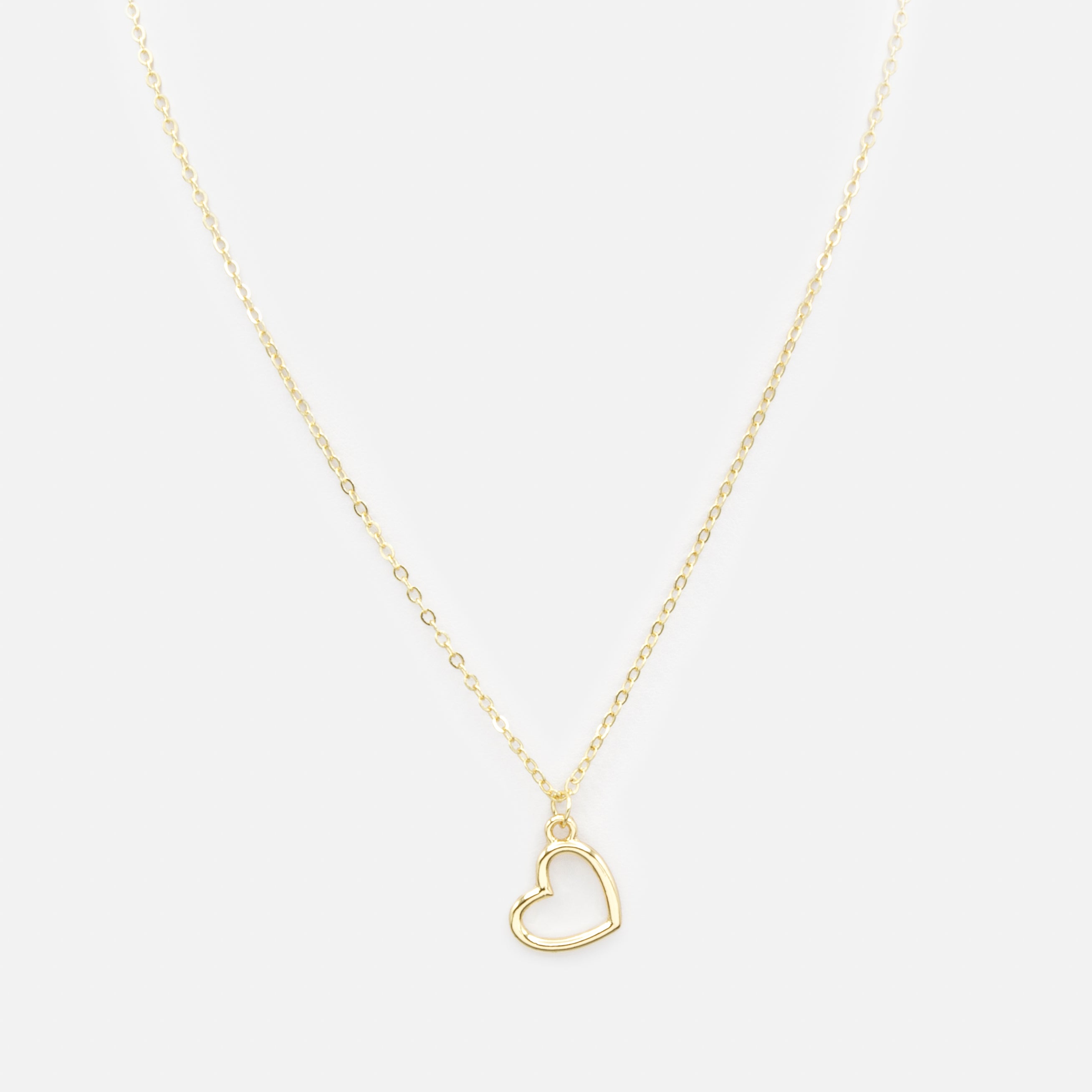 Collier doré avec breloque grand coeur