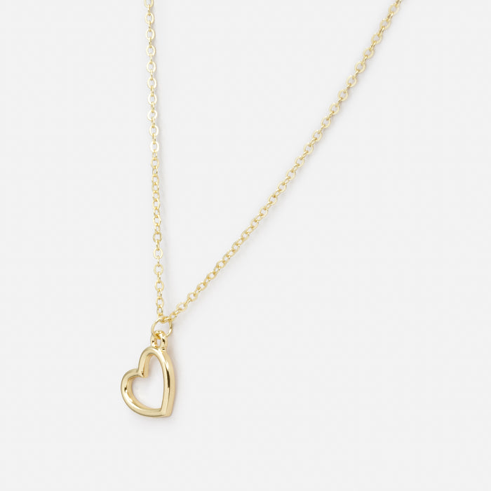 Collier doré avec breloque grand coeur