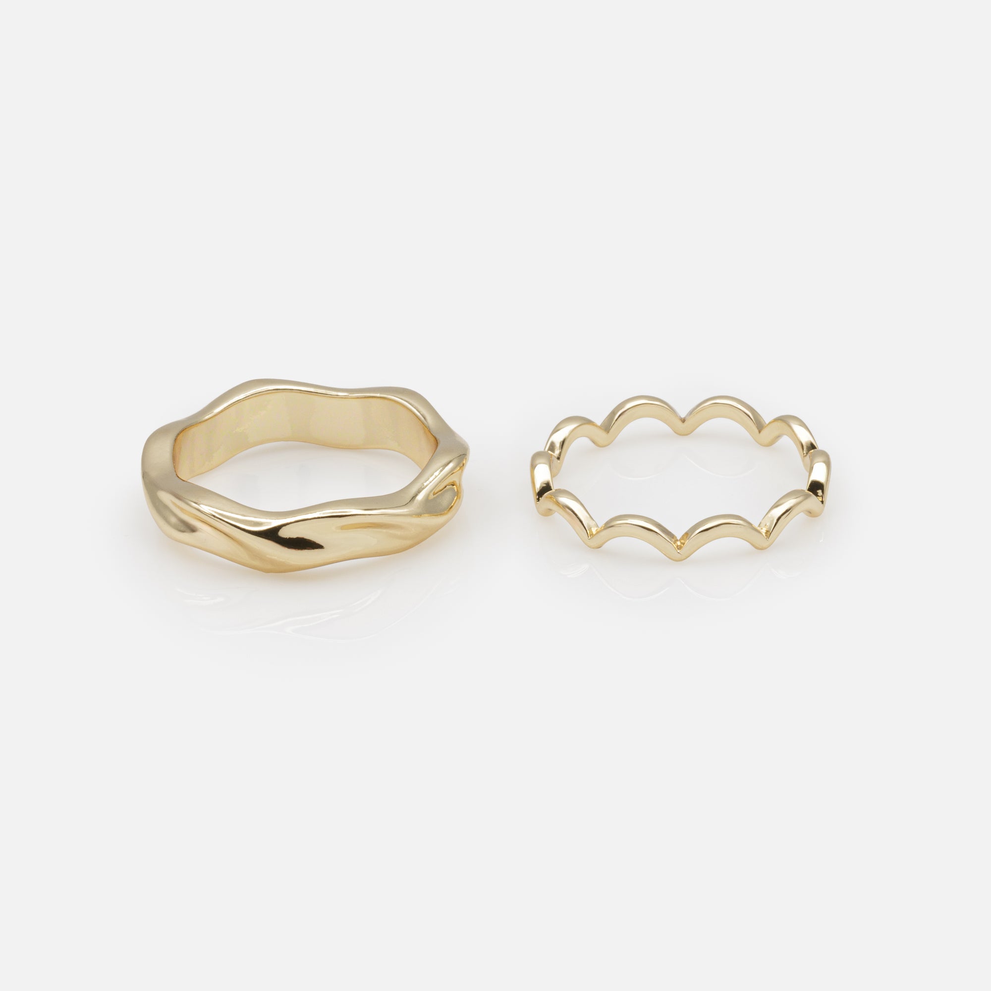 Duo of golden wave rings