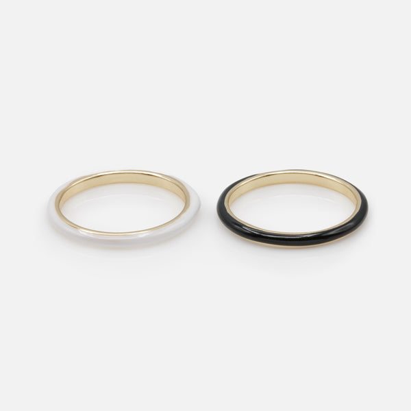 Load image into Gallery viewer, Duo of black and white gold rings
