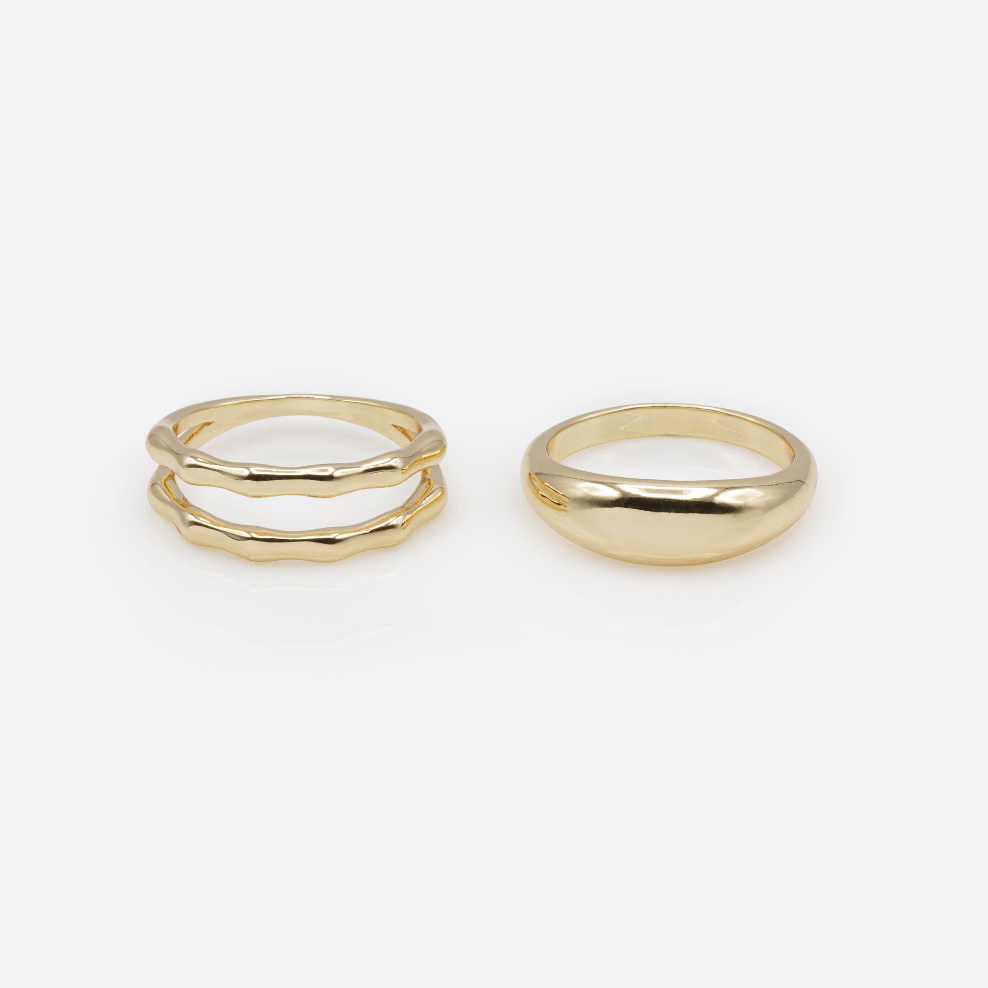 Duo of golden rings: double embossed ring and single ring