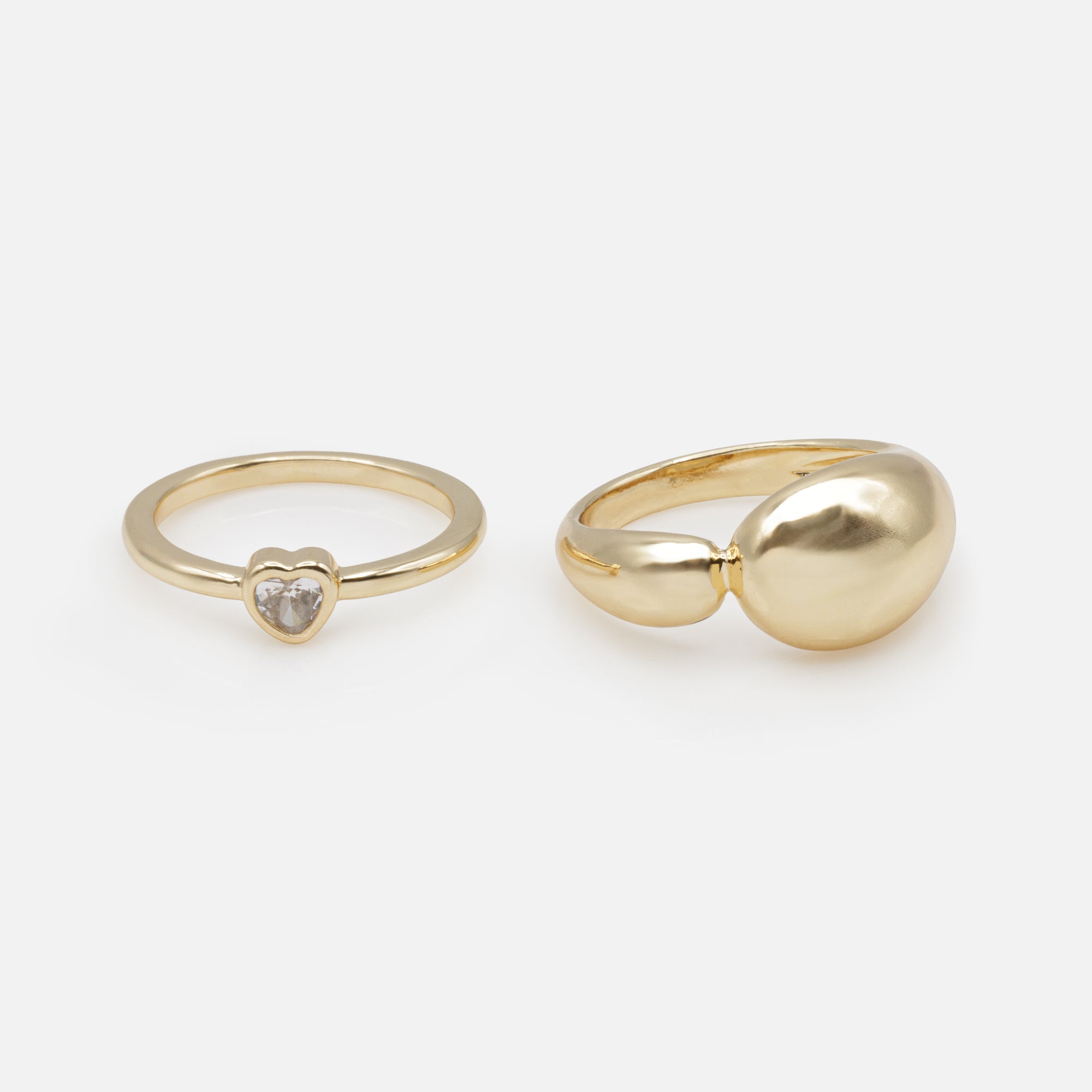 Duo of golden heart rings