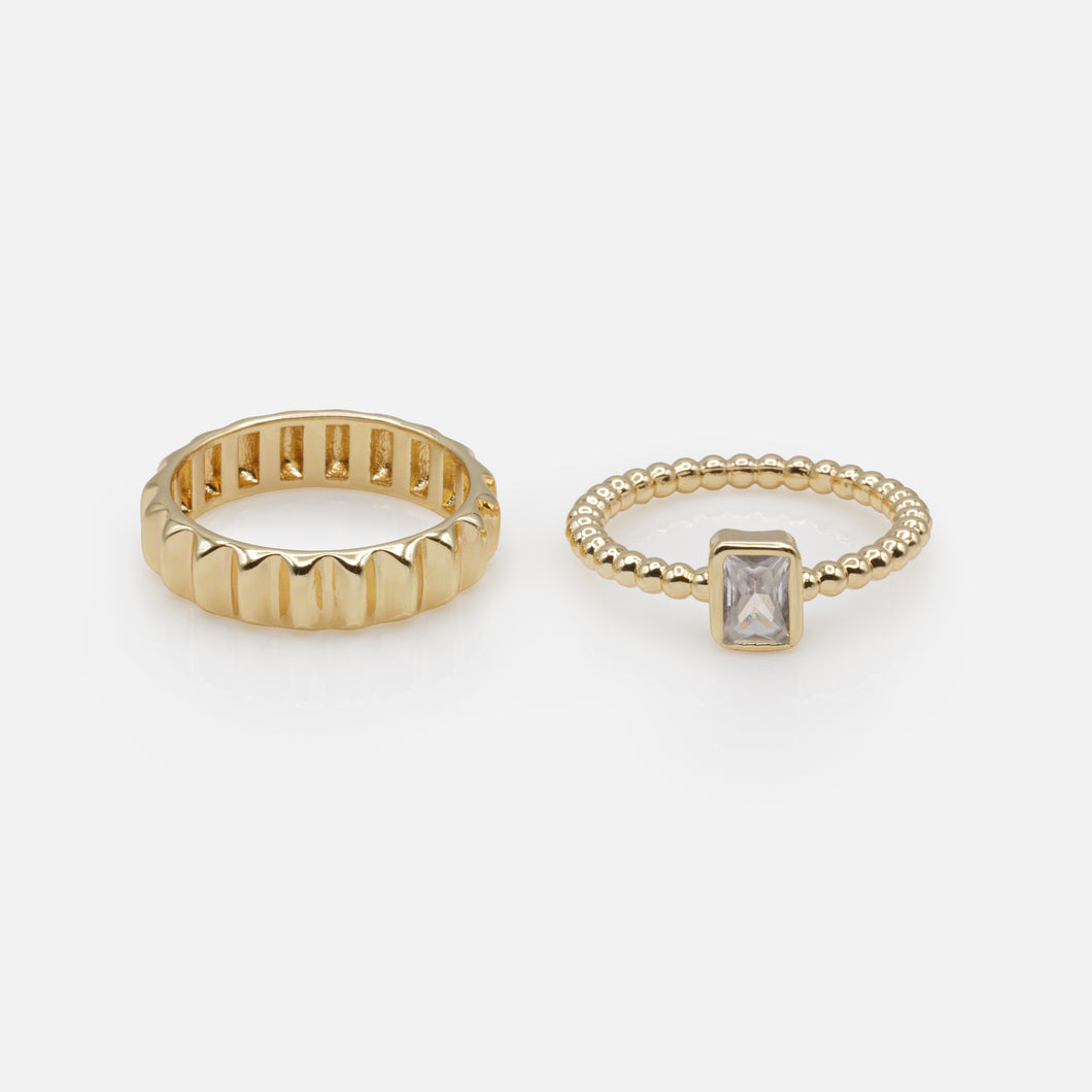 Duo of golden rings with rectangular stone and embossed ring