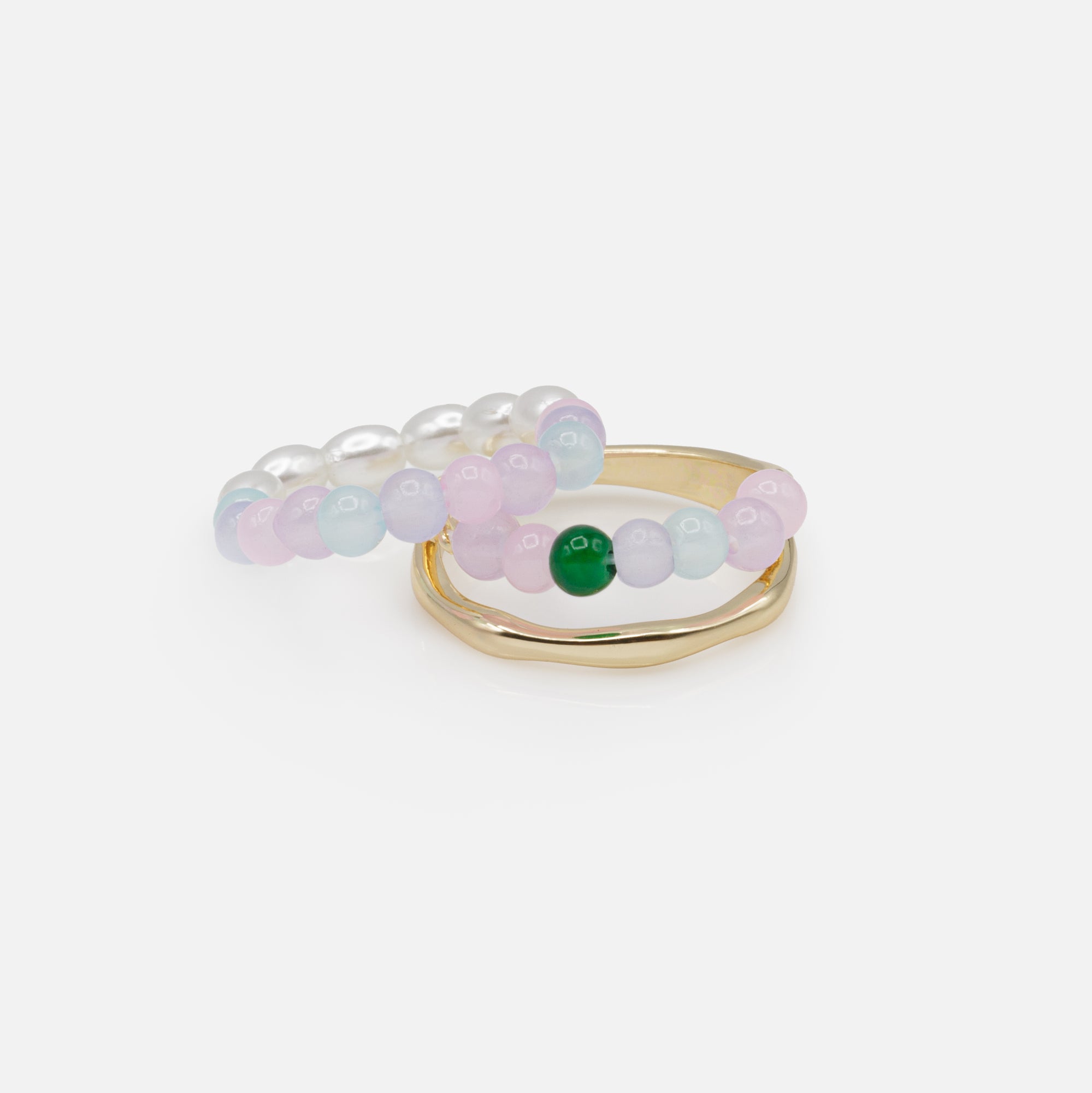 Duo of golden and expandable rings with colored beads