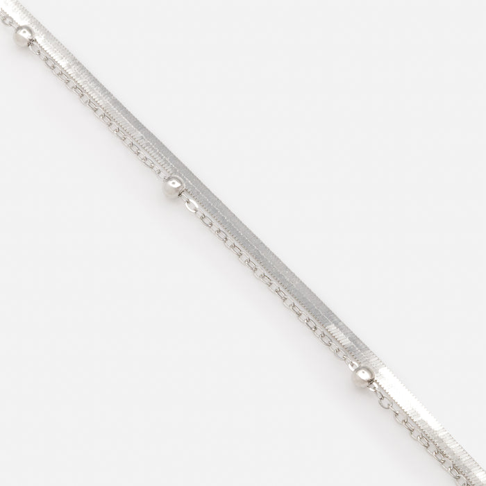 Silver double chain bracelet with flat and forced links and beads