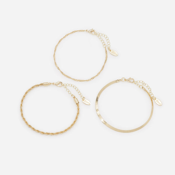 Load image into Gallery viewer, Trio of gold bracelets with flat and twisted links
