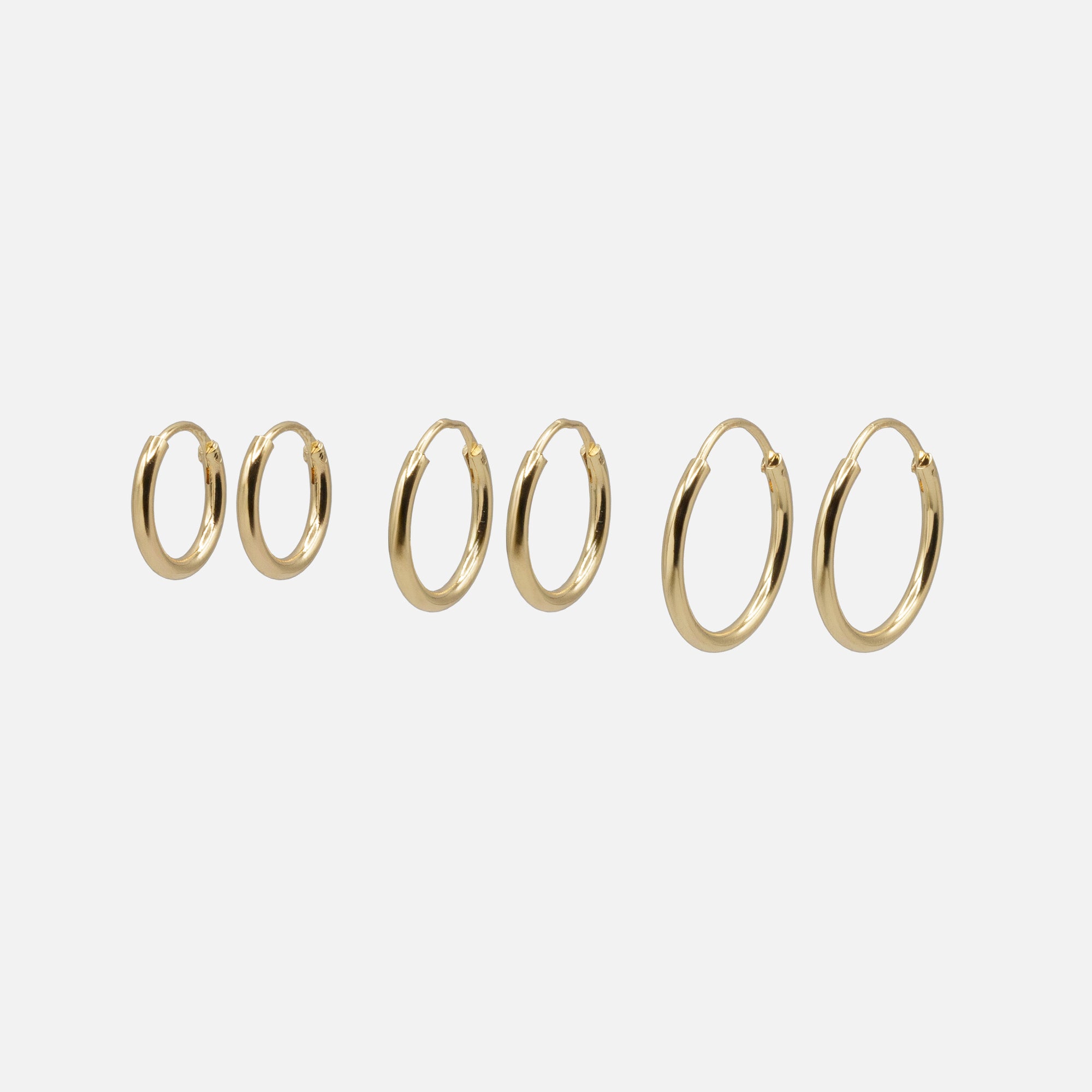 Trio de boucles d'oreilles dormeuses dorées