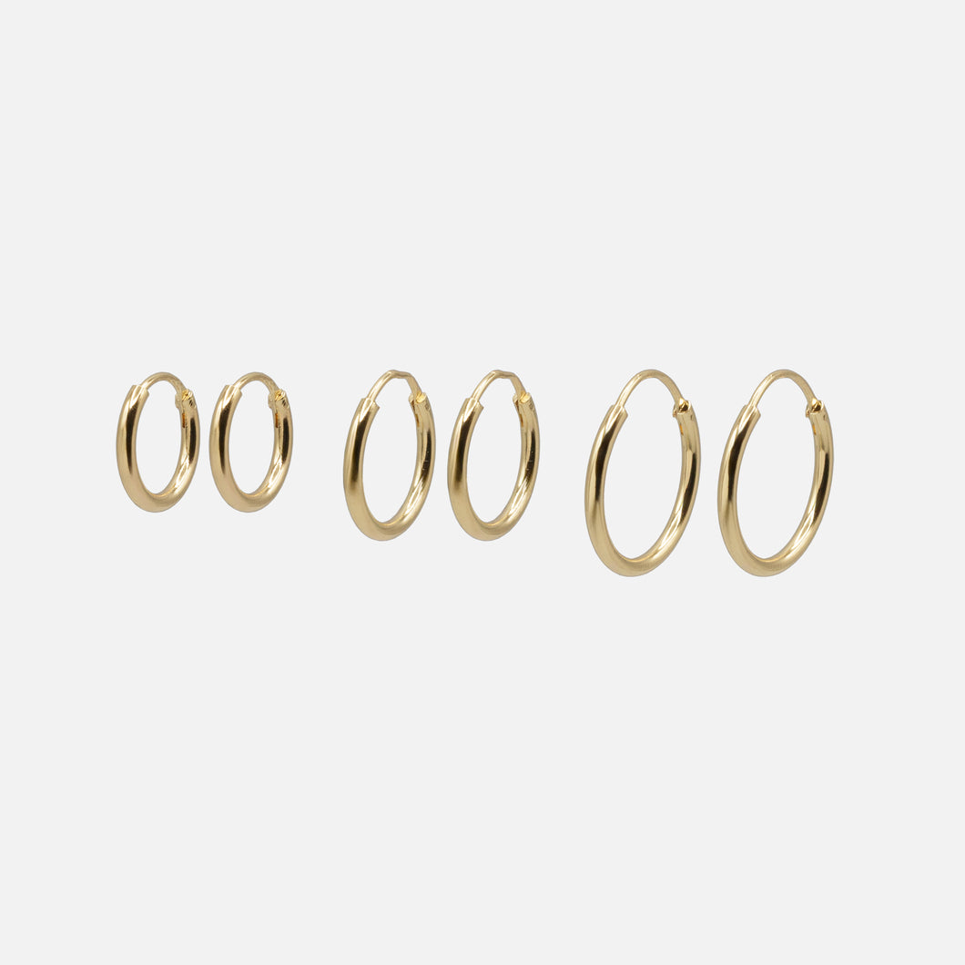 Trio de boucles d'oreilles dormeuses dorées