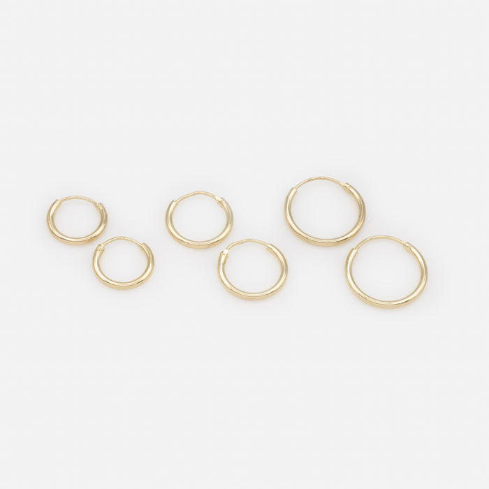 Trio de boucles d'oreilles dormeuses dorées