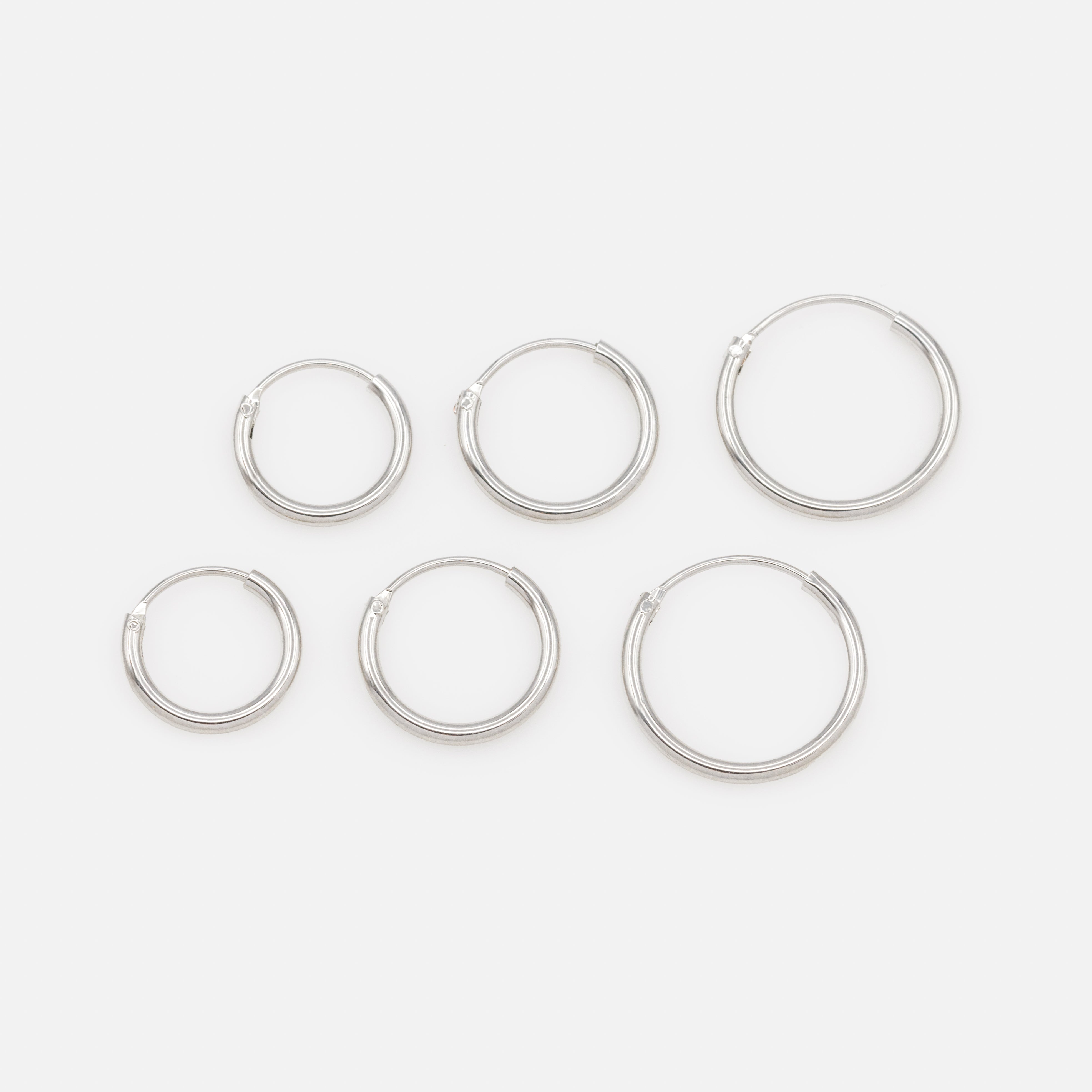 Trio de boucles d'oreilles dormeuses argentées
