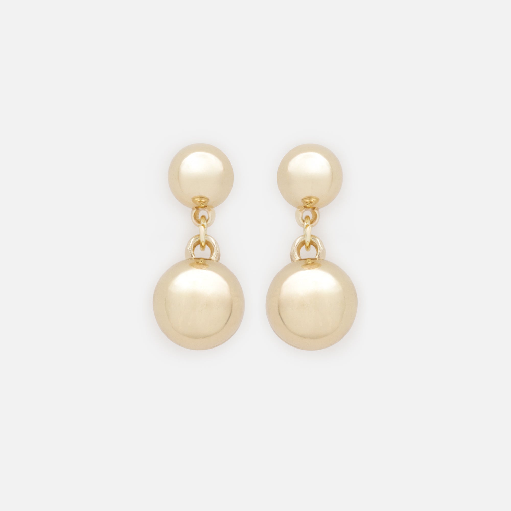 Boucles d'oreilles dorées sphères pendantes