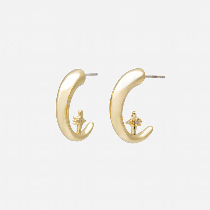 Boucles d'oreilles demi-anneaux dorés avec étoile et zircon cubique