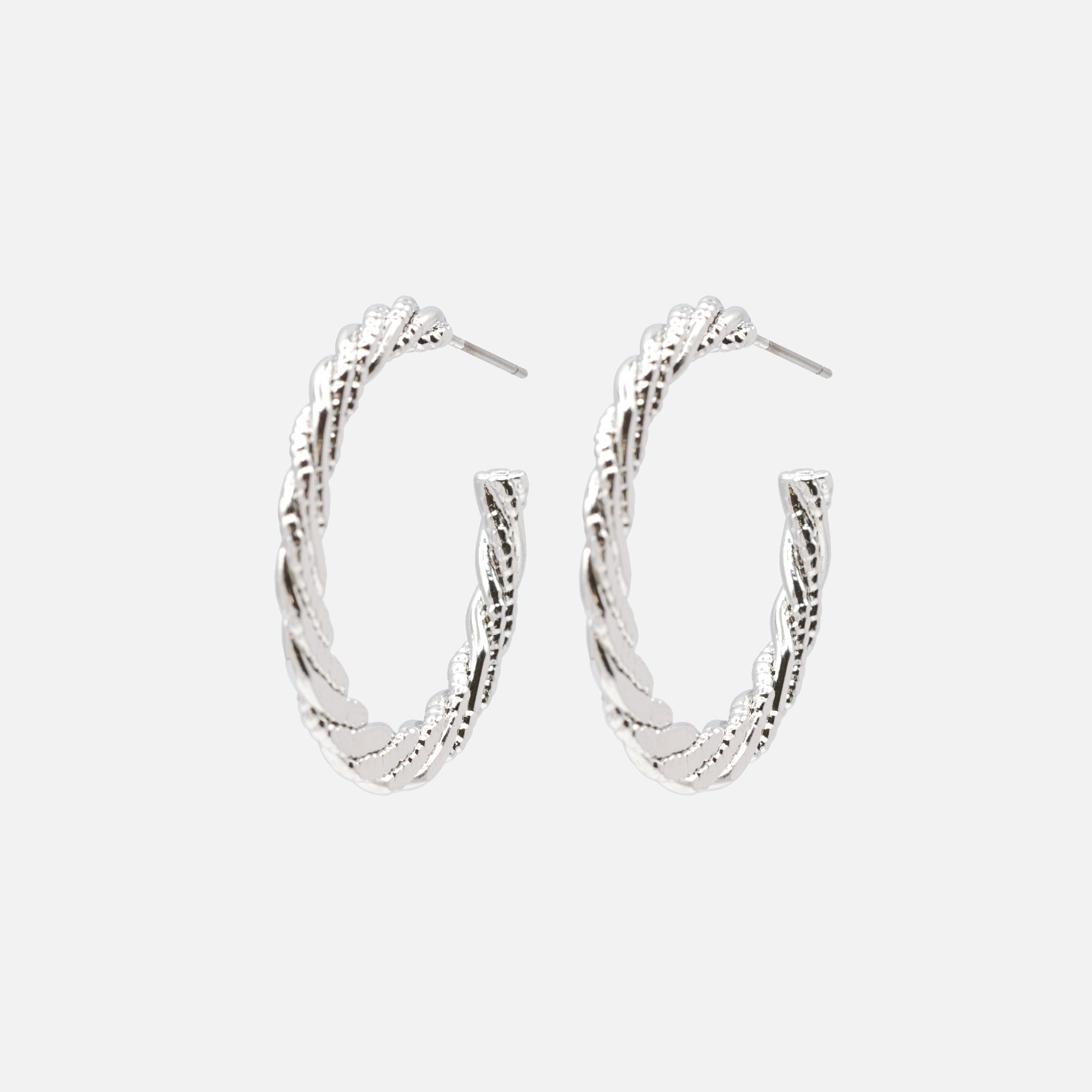 Boucles d'oreilles anneaux argentés torsadés et texturés