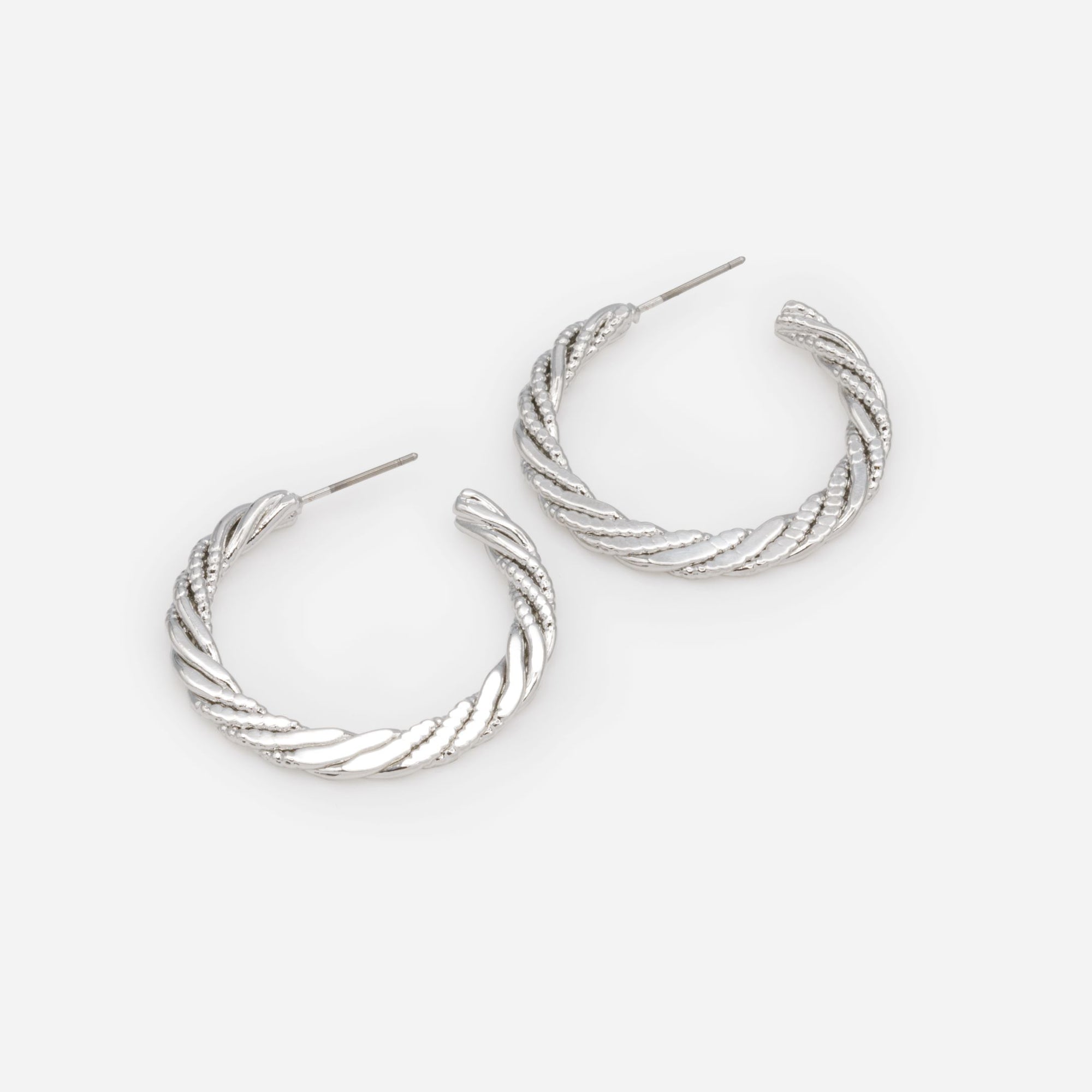 Boucles d'oreilles anneaux argentés torsadés et texturés